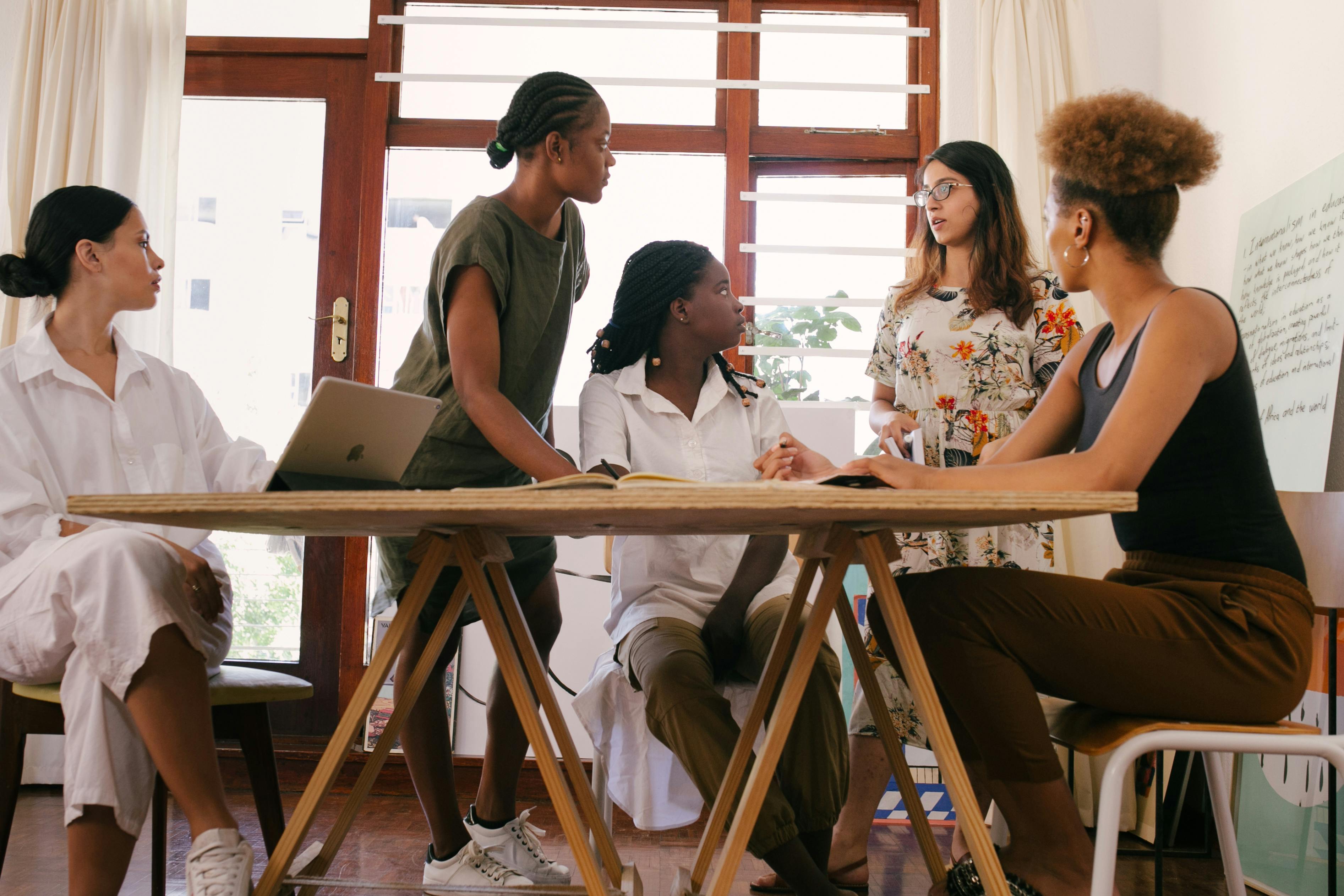 Professionals collaborating during a workshop session